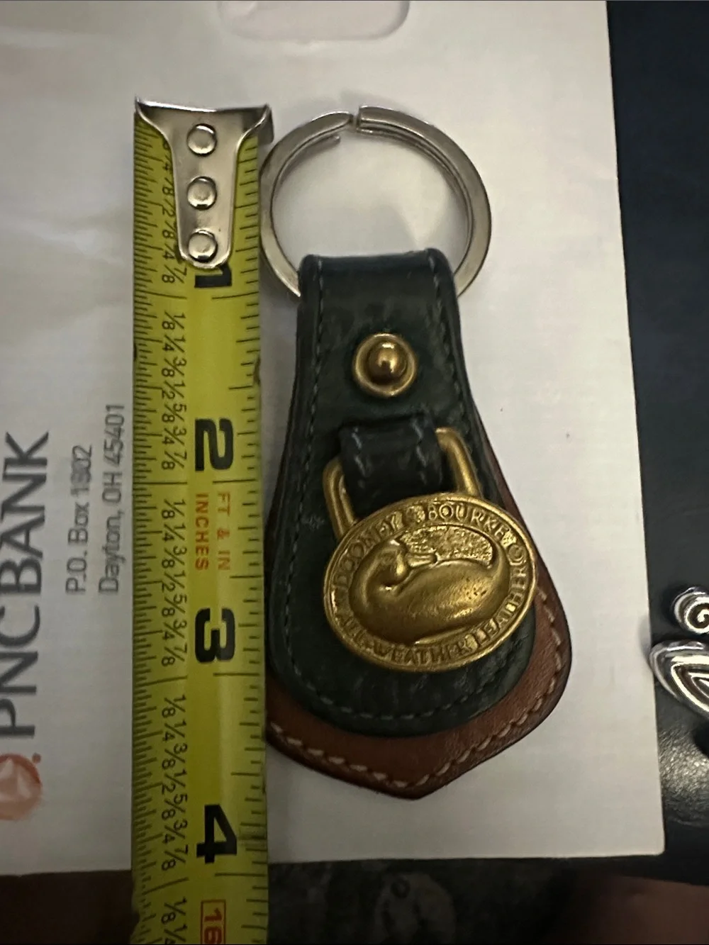 Dooney & Bourke Leather Key Fob with Brass Medallion - Green and Brown